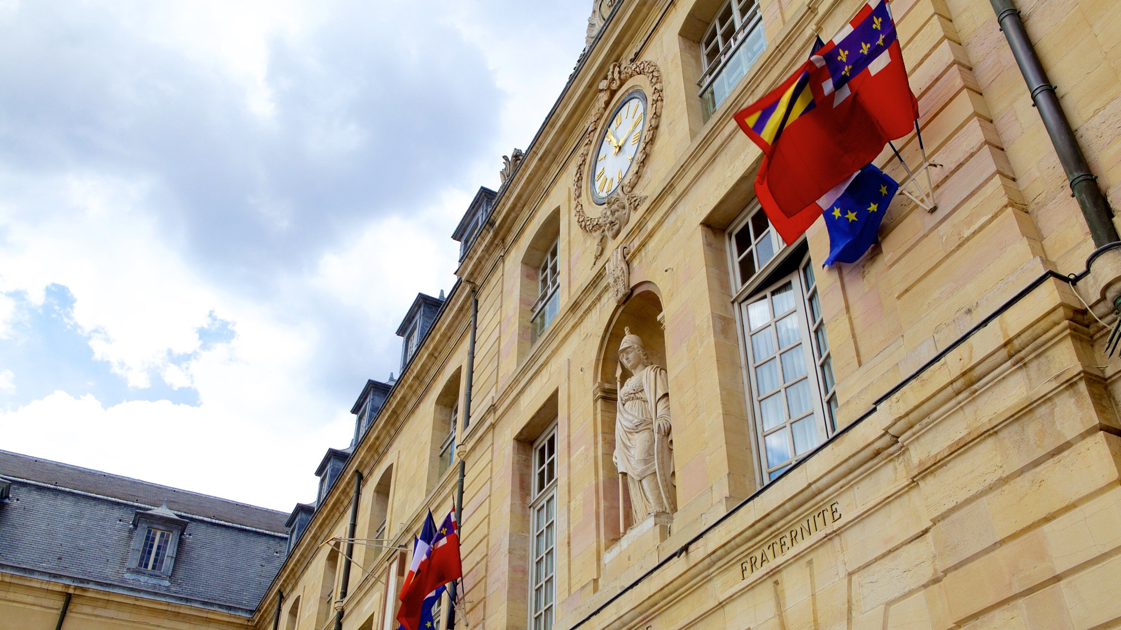 Palace of the Dukes featuring heritage elements and a statue or sculpture