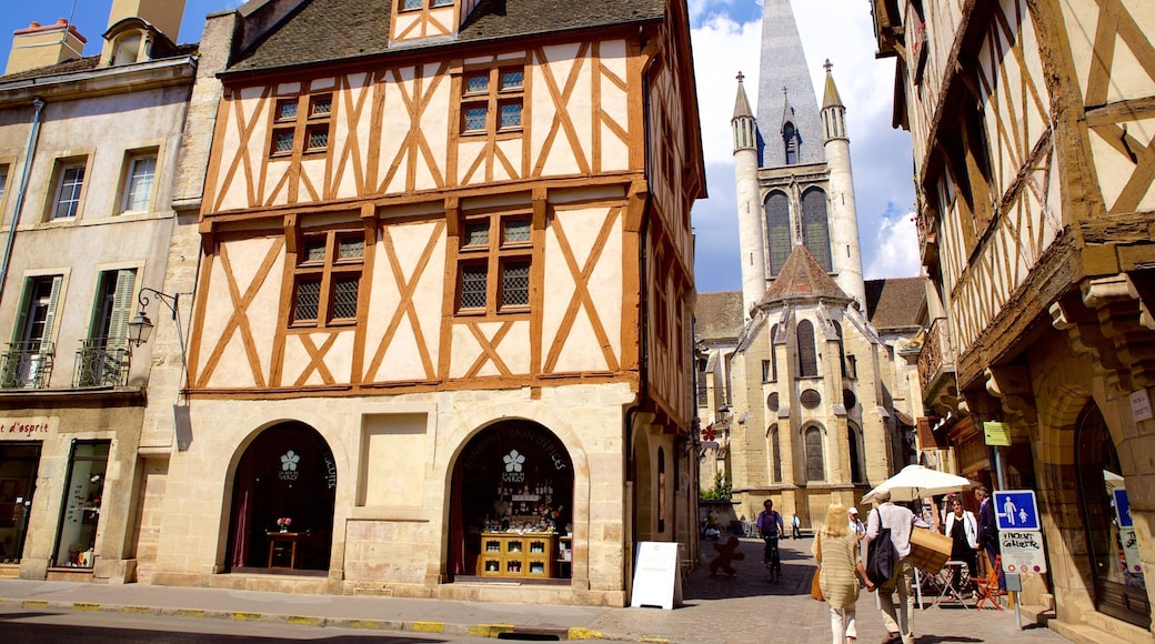 Church of Notre Dame featuring a house and street scenes