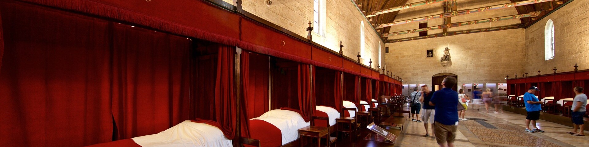 Hotel Dieu which includes heritage elements and interior views as well as a small group of people