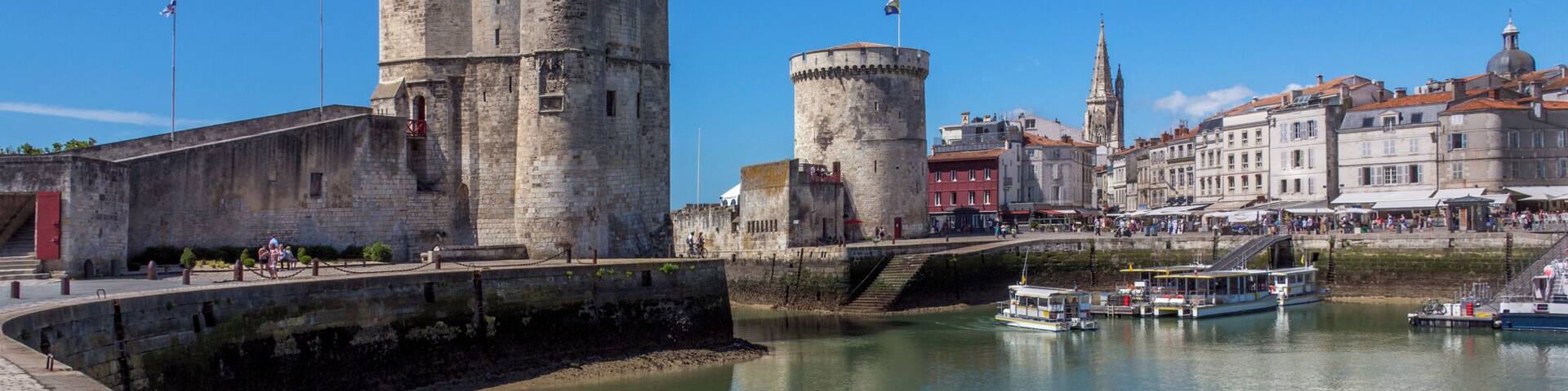 The port of La Rochelle on the coast of the Poitou-Charentes region of France. The towers date from the 11th century.