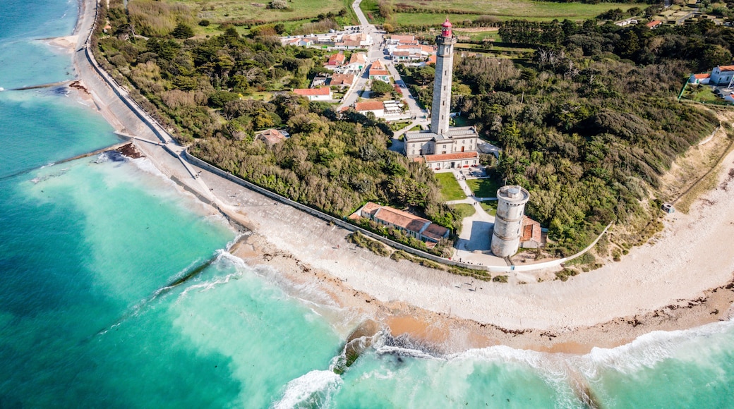Aerial drone panorama shot of the Phare des Baleines or Lighthouse of the Whales taken from the sea on Ile de Ré or island of Re France