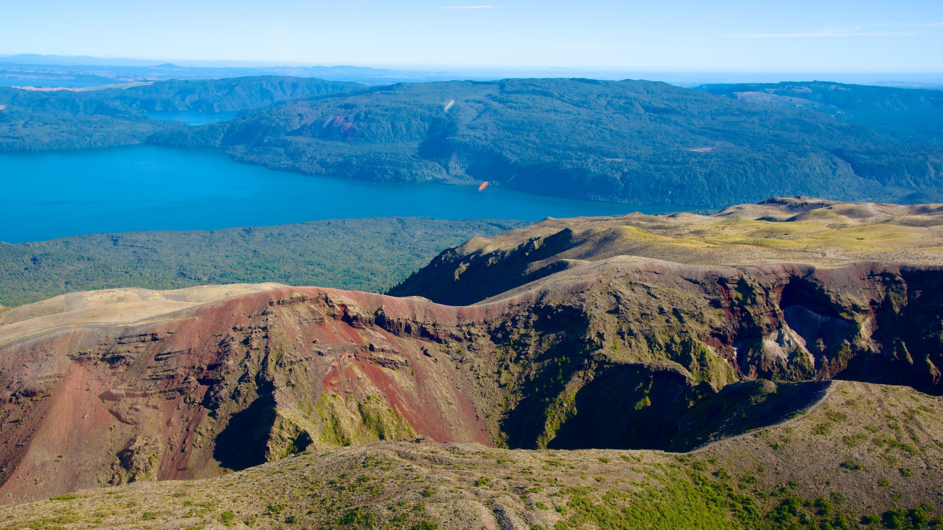 Mount Tarawera featuring landscape views and a lake or waterhole