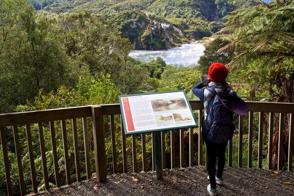 Waimangu Volcanic Valley showing a river or creek, views and signage