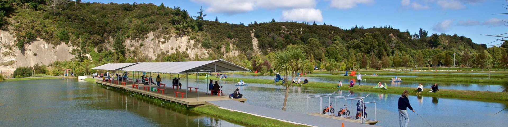 Prawn Farm which includes fishing and a lake or waterhole as well as a small group of people