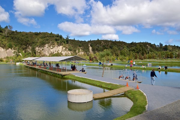 Prawn Farm which includes fishing and a lake or waterhole as well as a small group of people