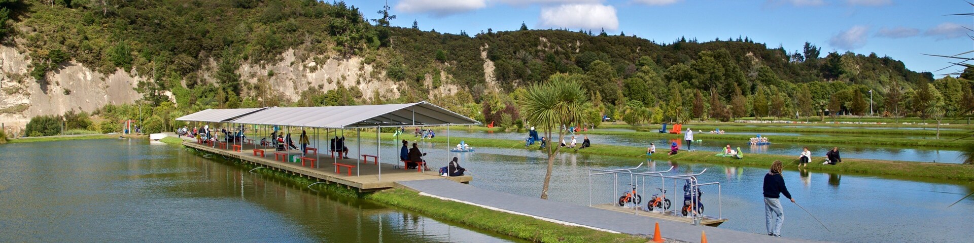 Prawn Farm which includes fishing and a lake or waterhole as well as a small group of people