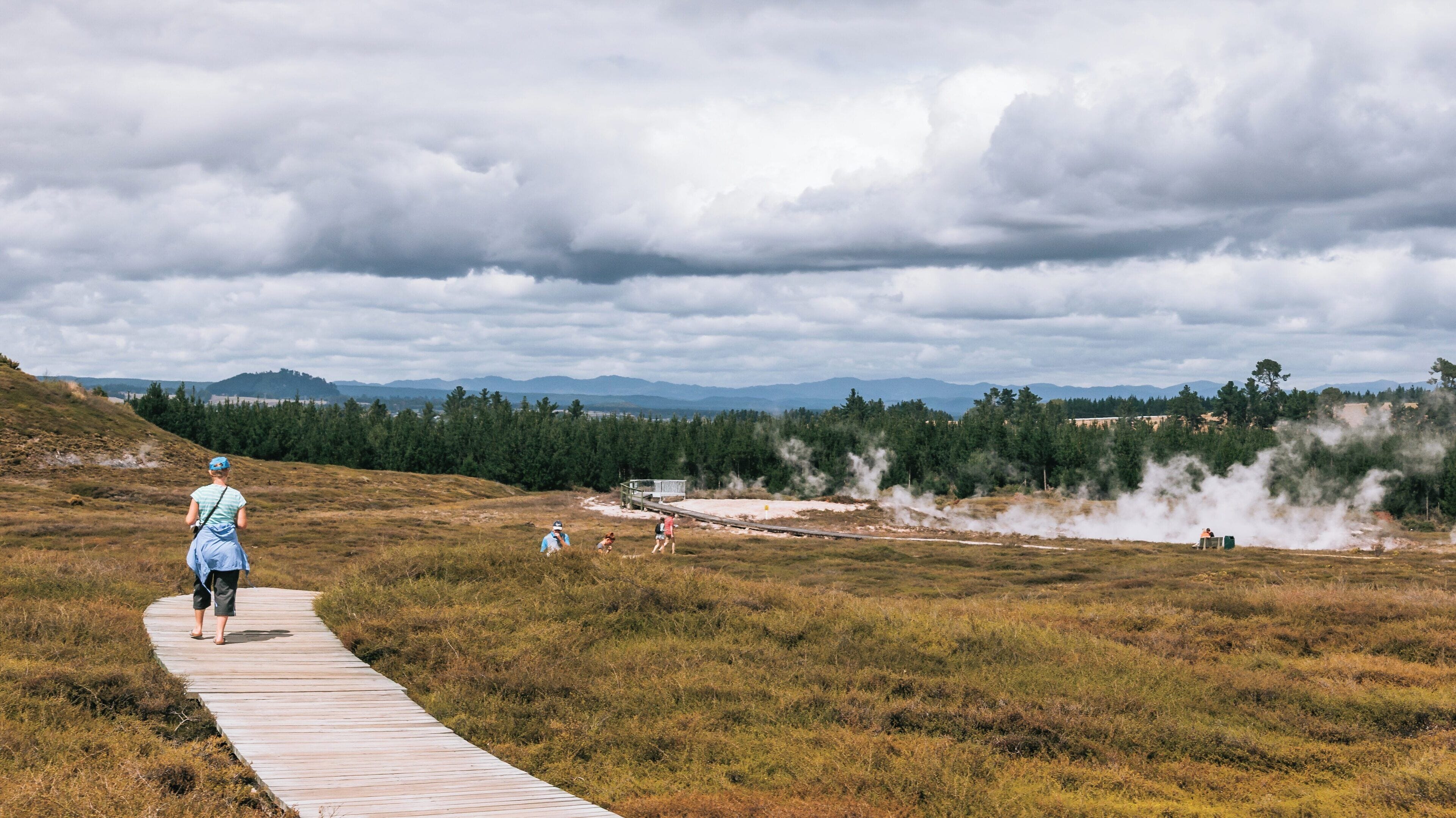 Exploring the unique geothermal landscape of Craters of the Moon in Taupo, New Zealand during a cloudy day