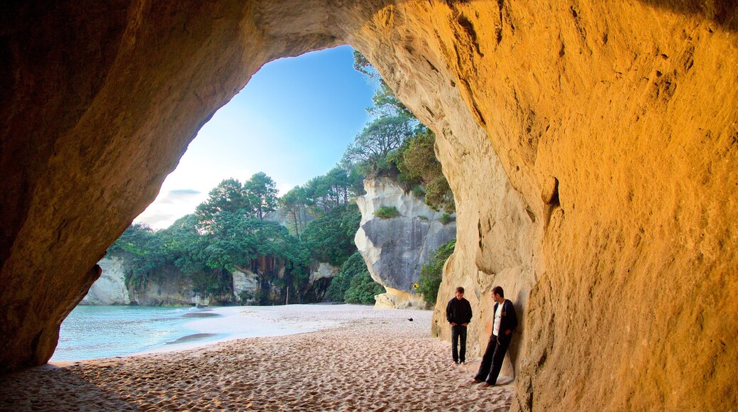 Cathedral Cove Beach showing rocky coastline, a beach and a bay or harbour