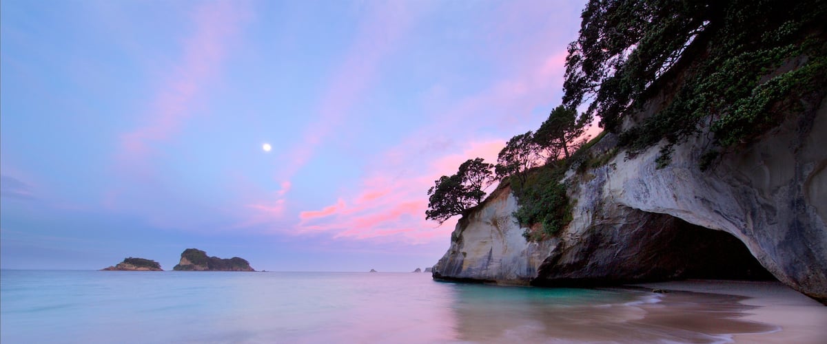 Shakespeare Lookout featuring rugged coastline, a bay or harbour and a sunset