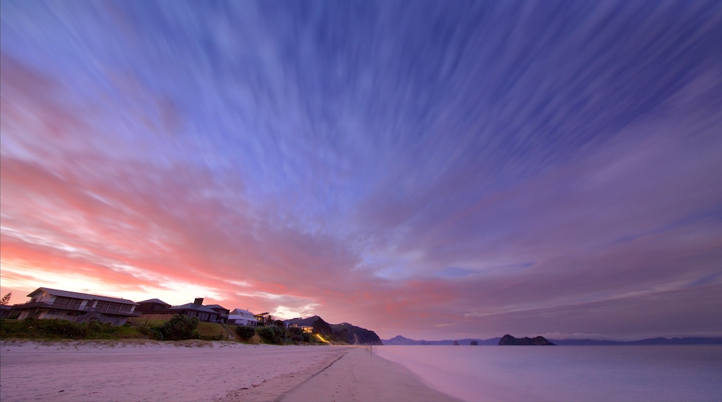 Shakespeare Cliff Lookout showing a beach, a sunset and a bay or harbor