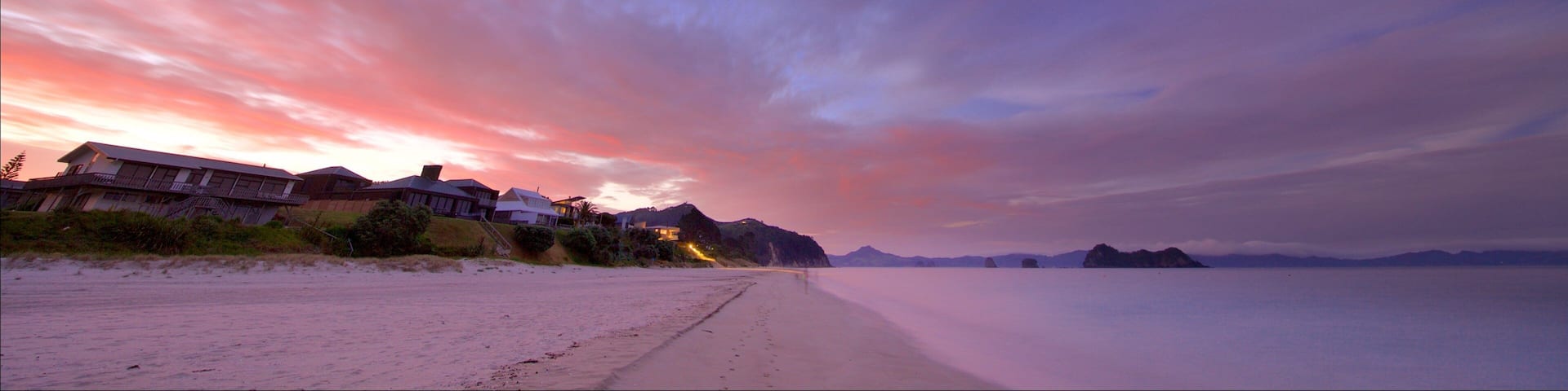 Shakespeare Cliff Lookout showing a beach, a sunset and a bay or harbor