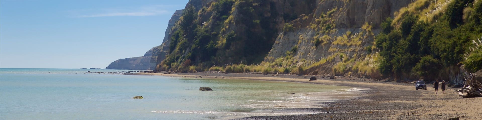 Cape Kidnappers showing a sandy beach, rocky coastline and general coastal views