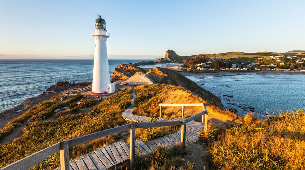 Castlepoint Lighthouse, Wairarapa, New Zealand, at sunrise.
