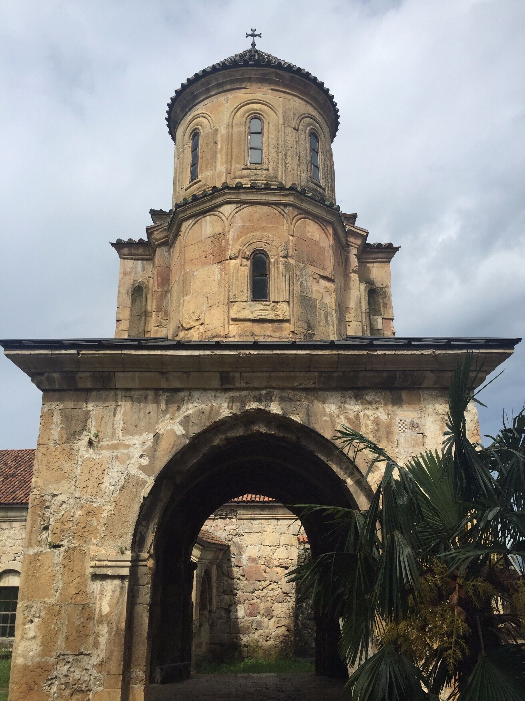 Gelati is a monastery founded by King David the Builder in 1106. It's easy to see how he got his name, as this UNESCO site is still intact and well preserved 900 years later. 
King David is buried here as well, and you can see his tombstone under one of the arches. Reportedly he wanted the monastic students to walk over his grave on their way to study every day to remind them of...who knows what?
You aren't allowed to walk over the tombstone anymore, which is probably a good thing!

www.visa-vis.com