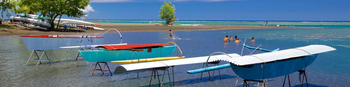 Black Sand Beach featuring swimming and general coastal views as well as a small group of people