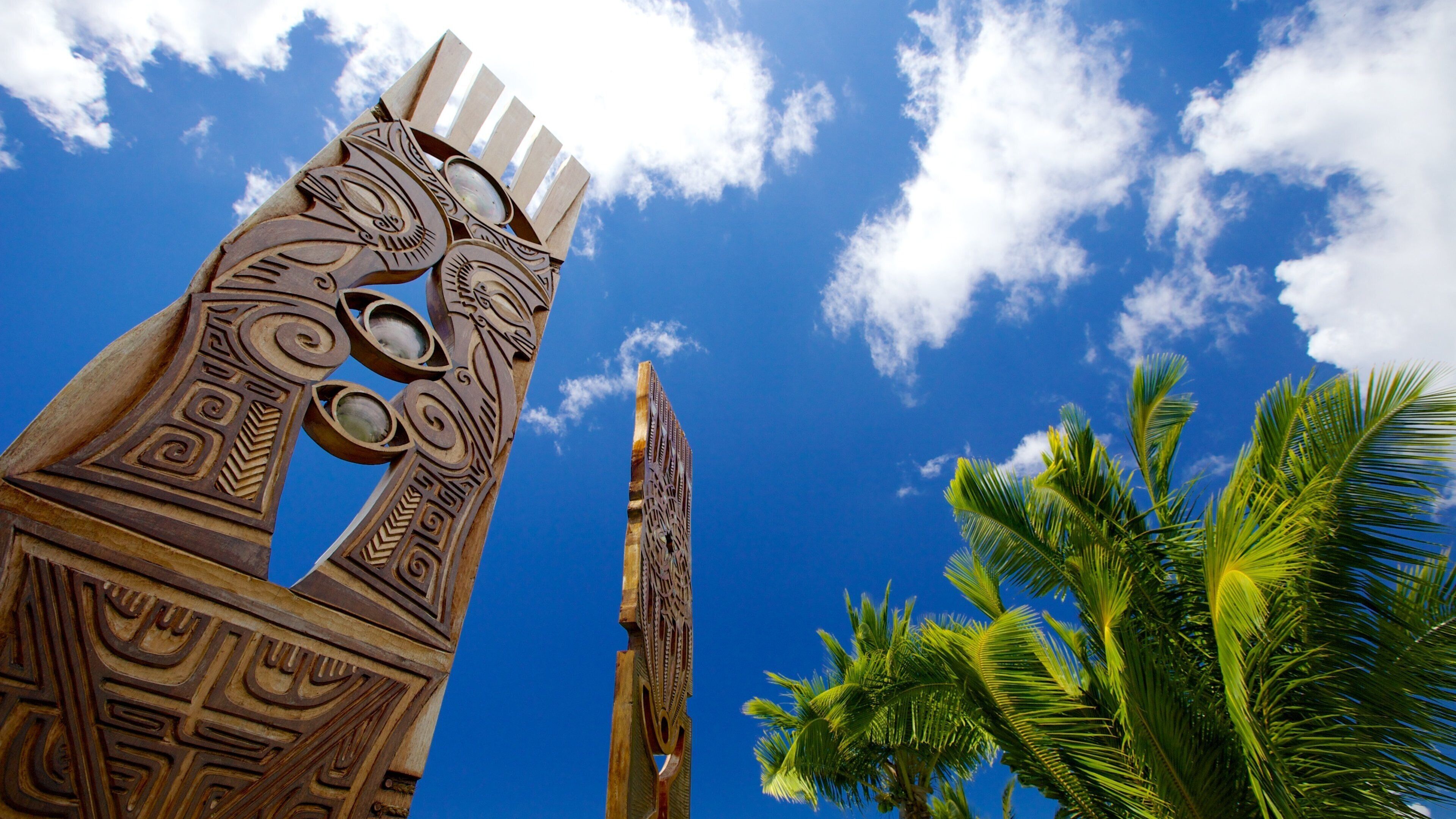 Place Jacques Chirac featuring outdoor art and tropical scenes