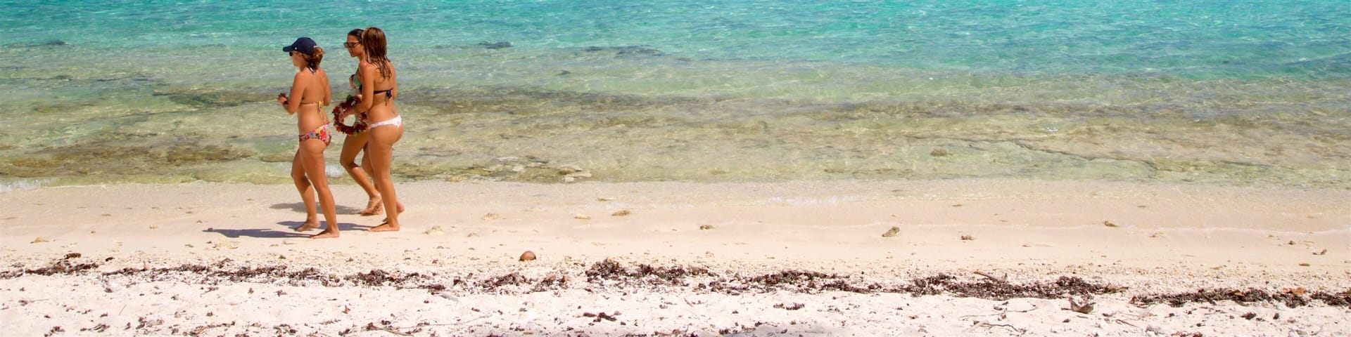 Temae Beach featuring a sandy beach, kayaking or canoeing and general coastal views