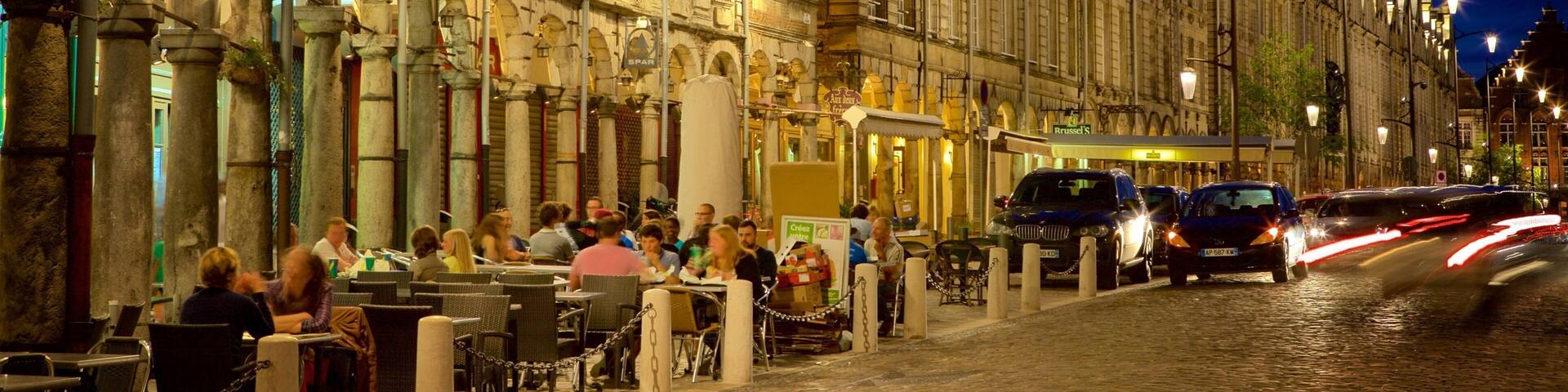 Grand Place featuring night scenes and dining out