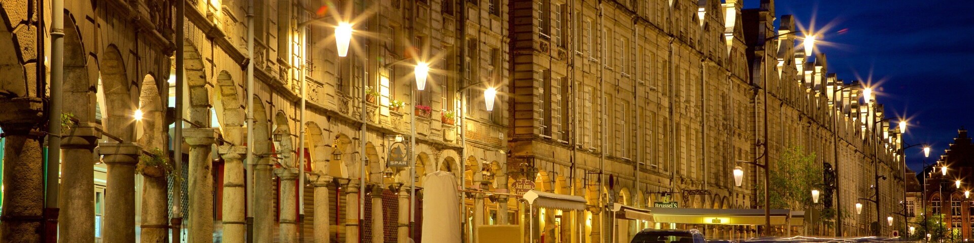 Grand Place which includes night scenes, dining out and nightlife