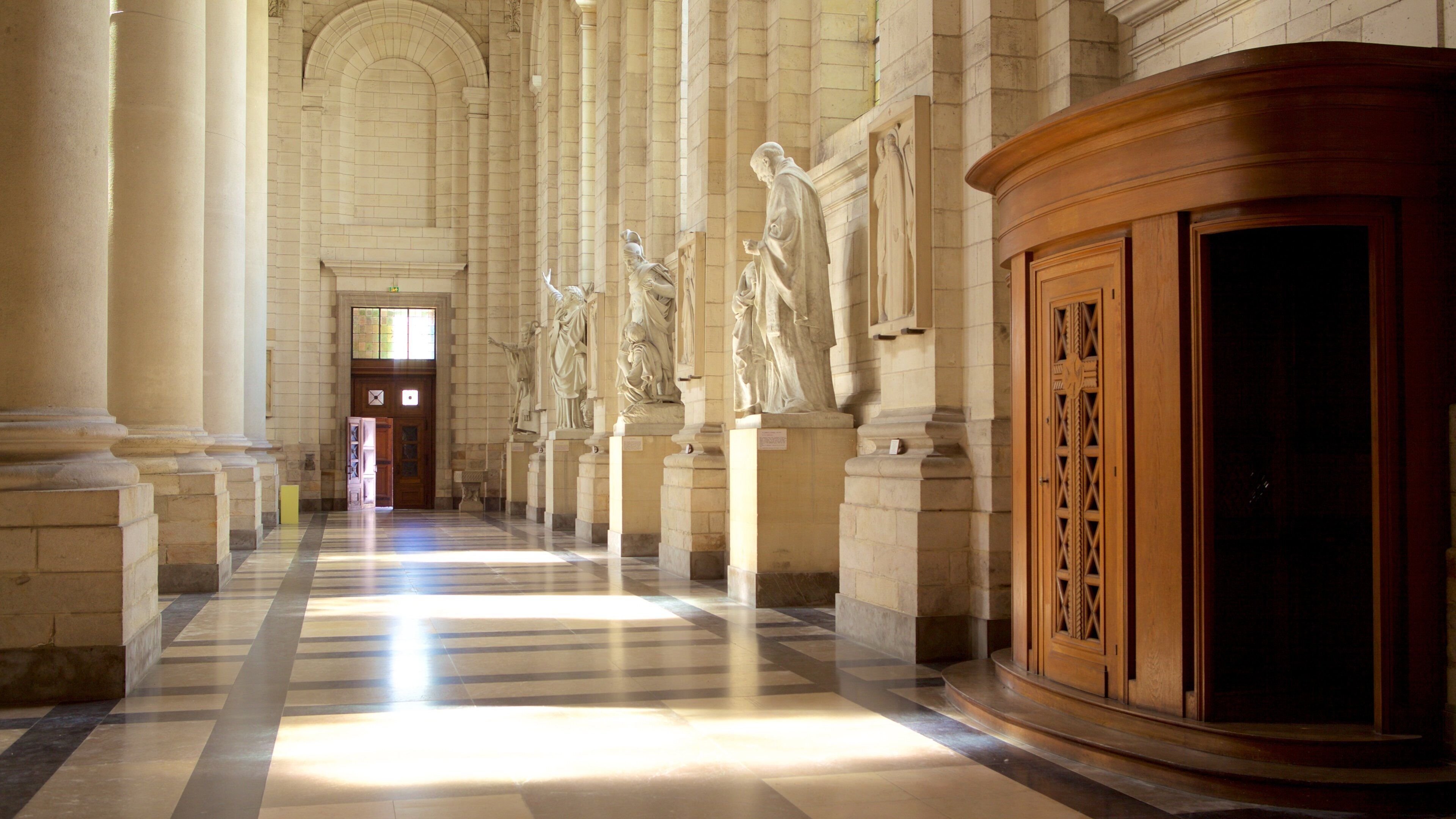 Notre Dame Cathedral featuring heritage elements, a statue or sculpture and religious aspects