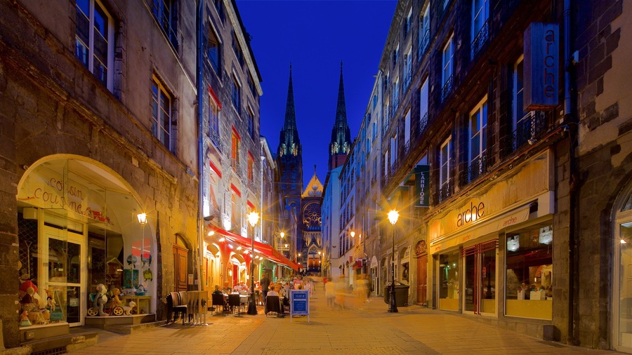 Clermont-Ferrand Cathedral featuring a city, night scenes and heritage architecture