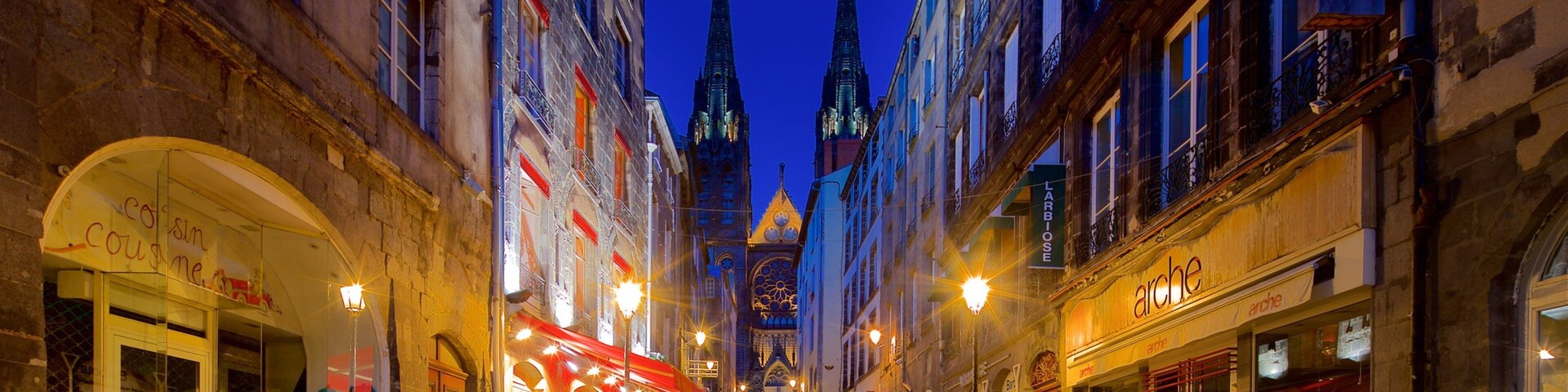 Clermont-Ferrand Cathedral which includes heritage architecture, night scenes and a church or cathedral