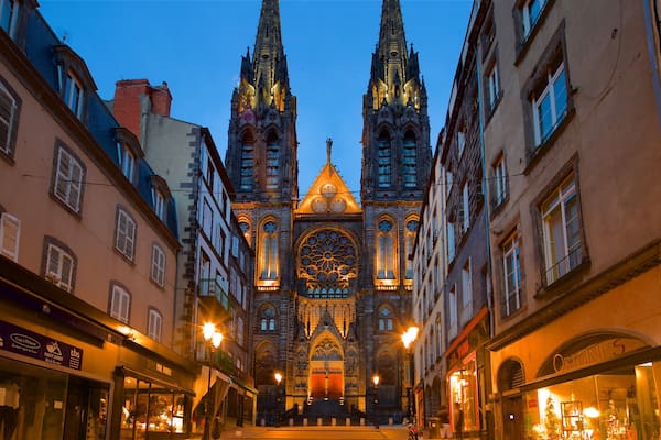 Clermont-Ferrand Cathedral which includes night scenes, a city and heritage architecture