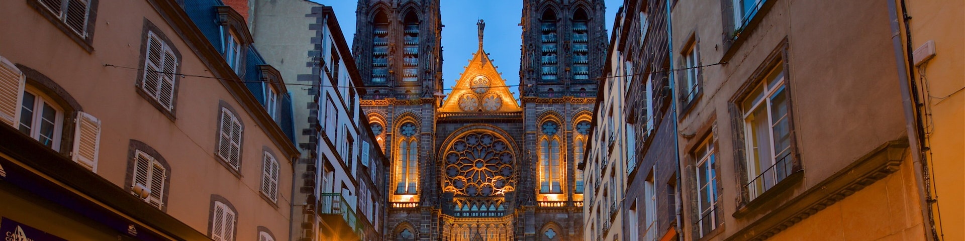 Clermont-Ferrand Cathedral which includes night scenes, a city and heritage architecture