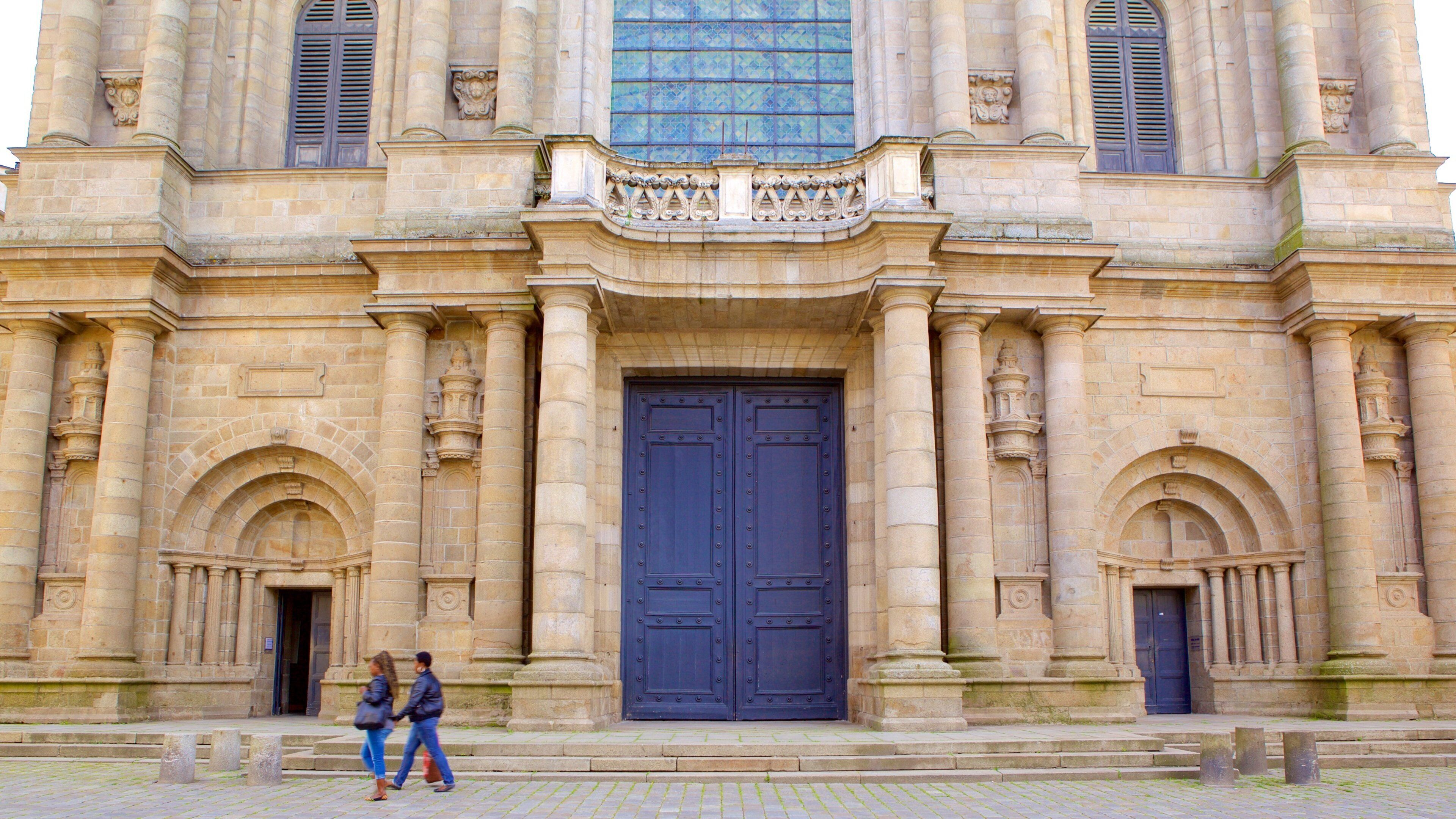 Rennes Cathedral showing heritage elements as well as a couple