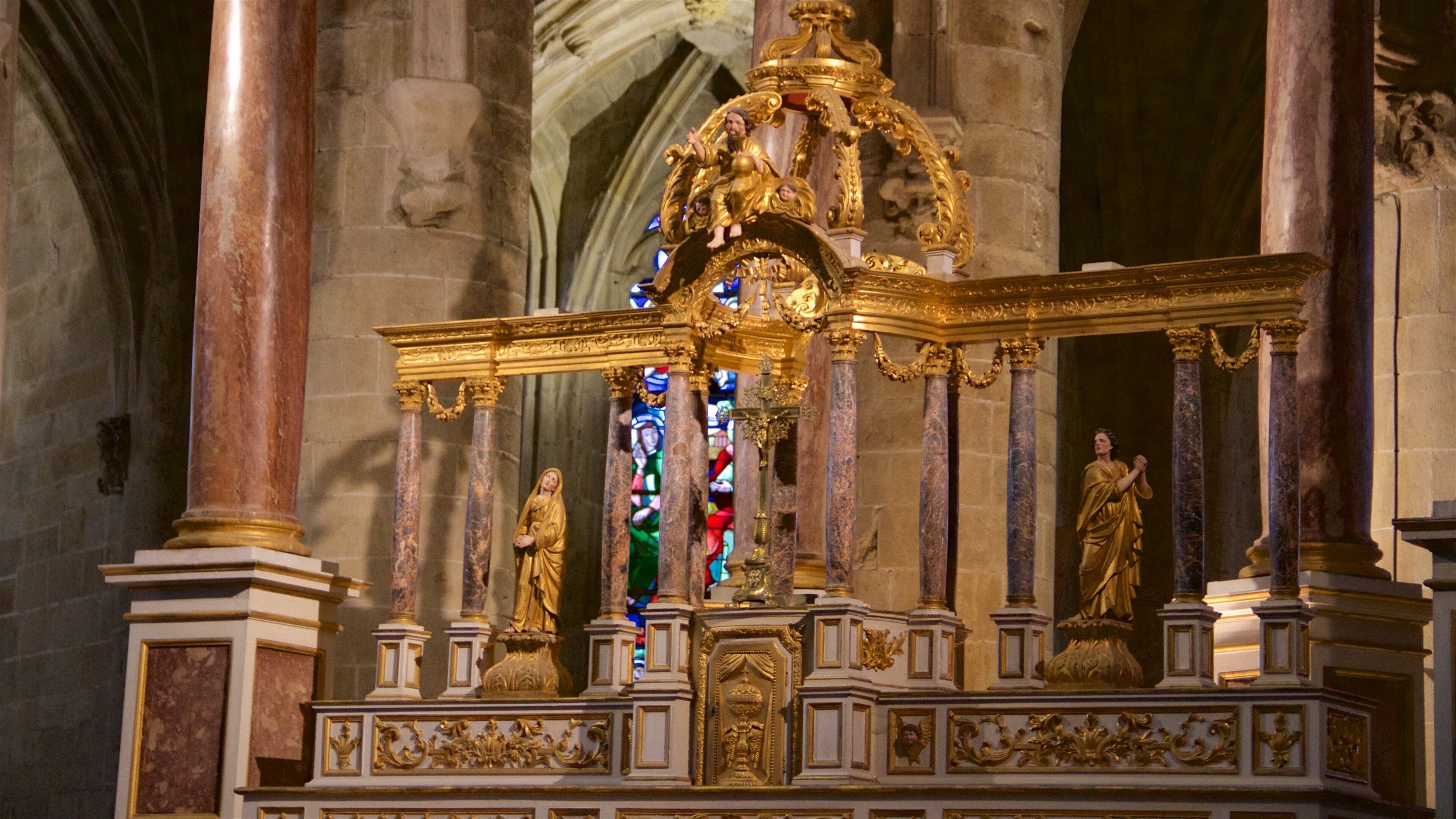 Saint Sauveur Church featuring interior views and religious elements