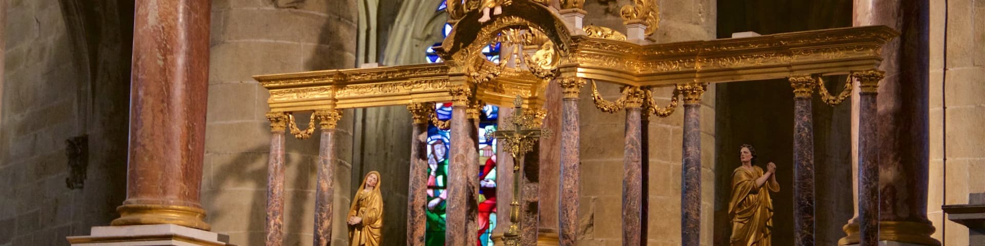 Saint Sauveur Church featuring interior views and religious elements