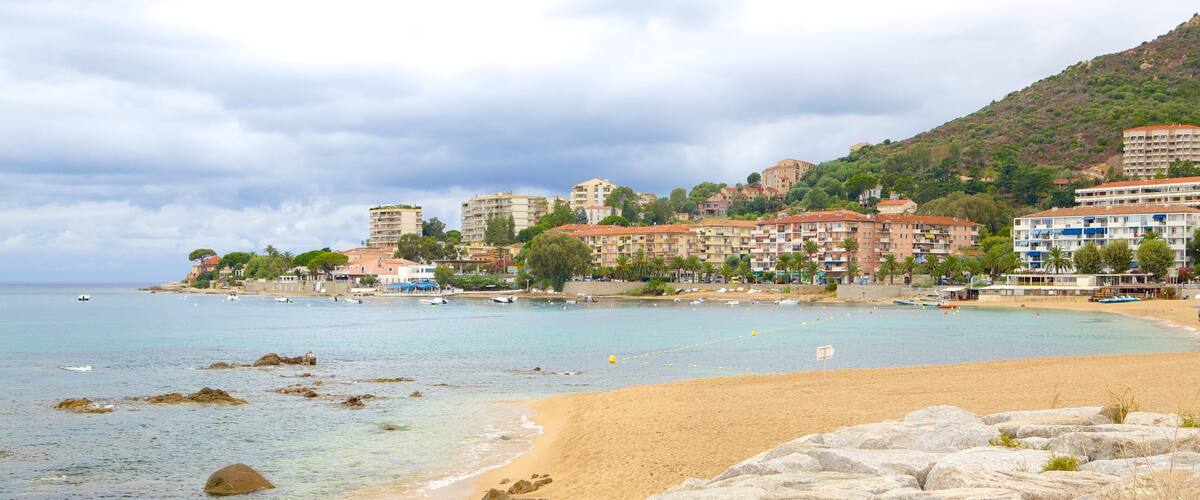 Trottel Beach featuring a coastal town and a sandy beach