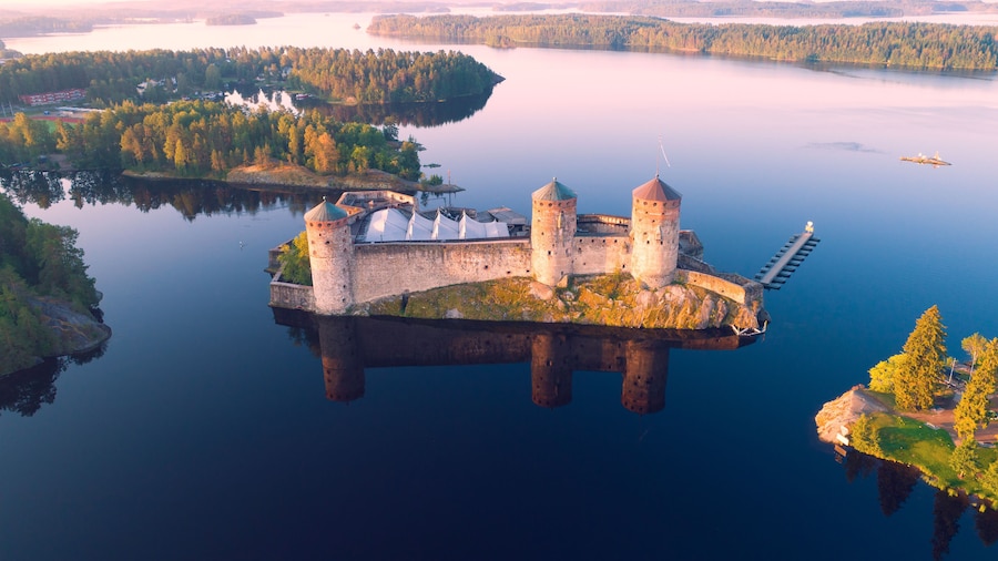 The medieval fortress of Olavinlinna in the morning landscape
