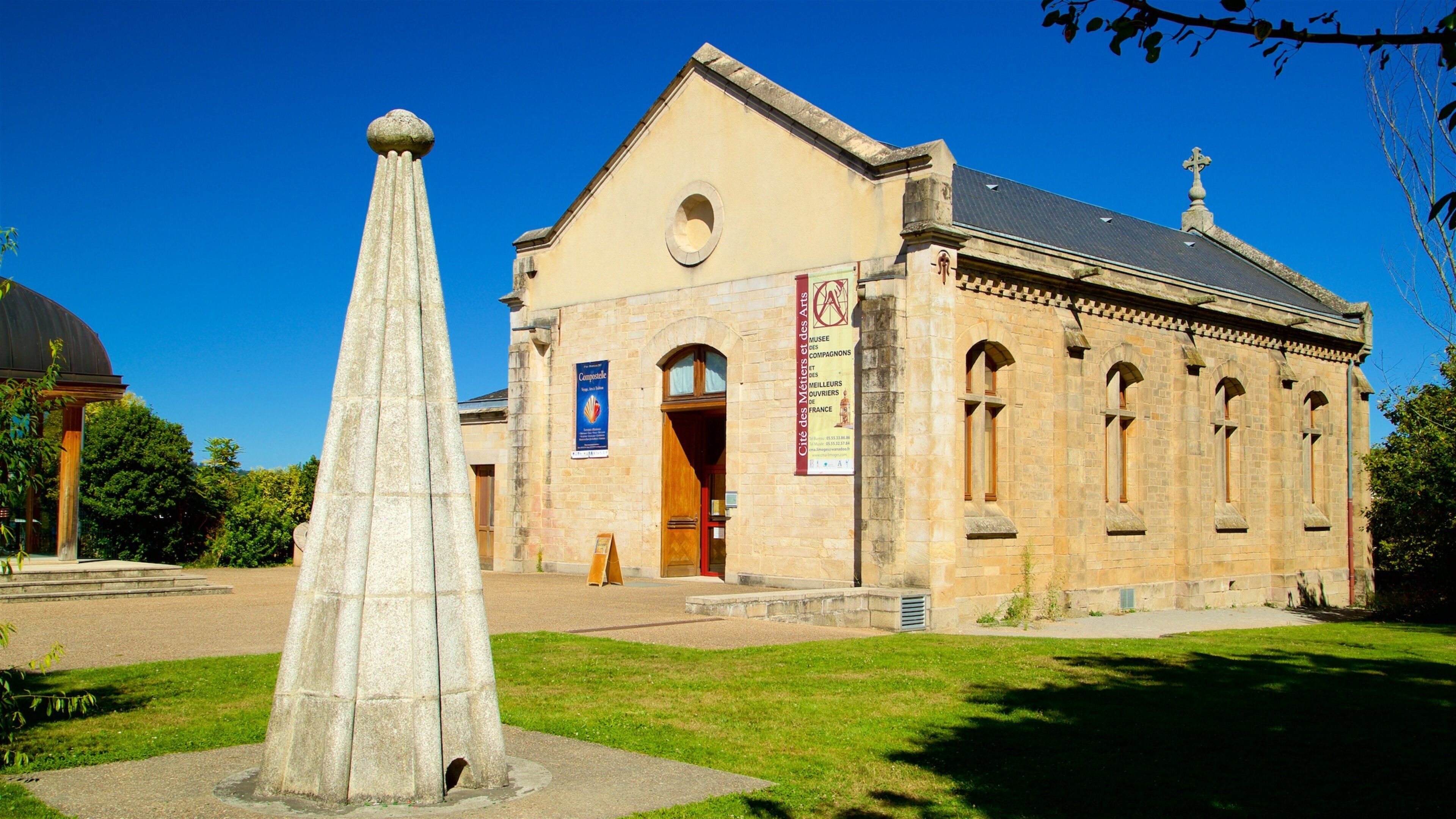 Jardin de l\'Eveche featuring heritage architecture and a church or cathedral