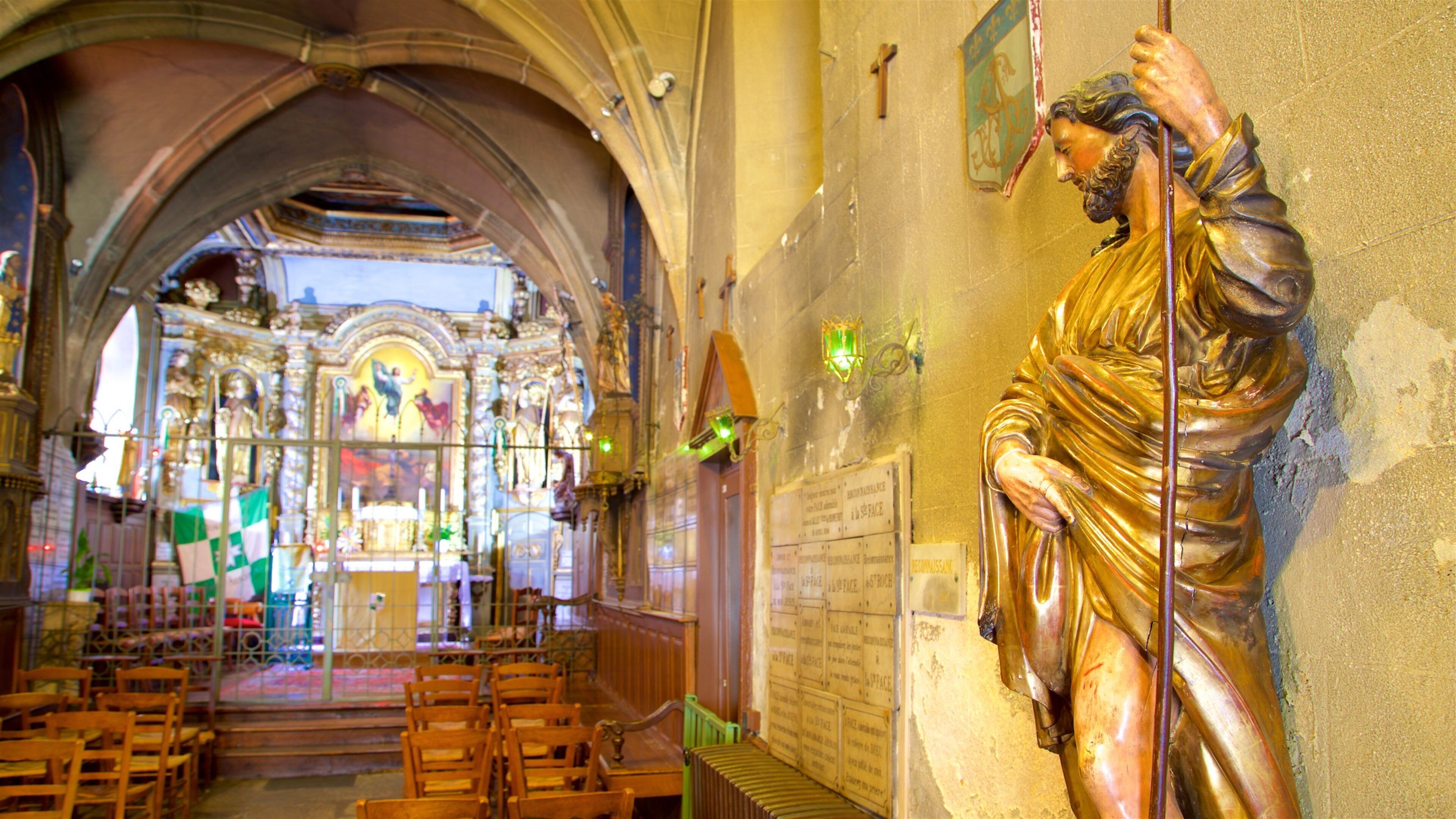 Chapel of St-Aurelien mostrando una estatua o escultura, vistas de interior y elementos religiosos