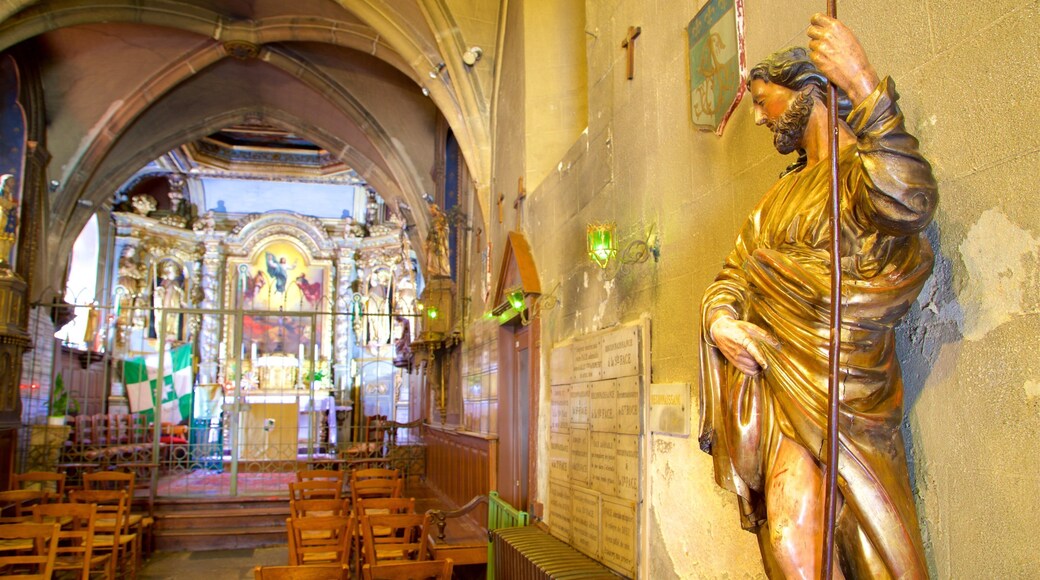 Chapel of St-Aurelien mostrando una estatua o escultura, vistas de interior y elementos religiosos
