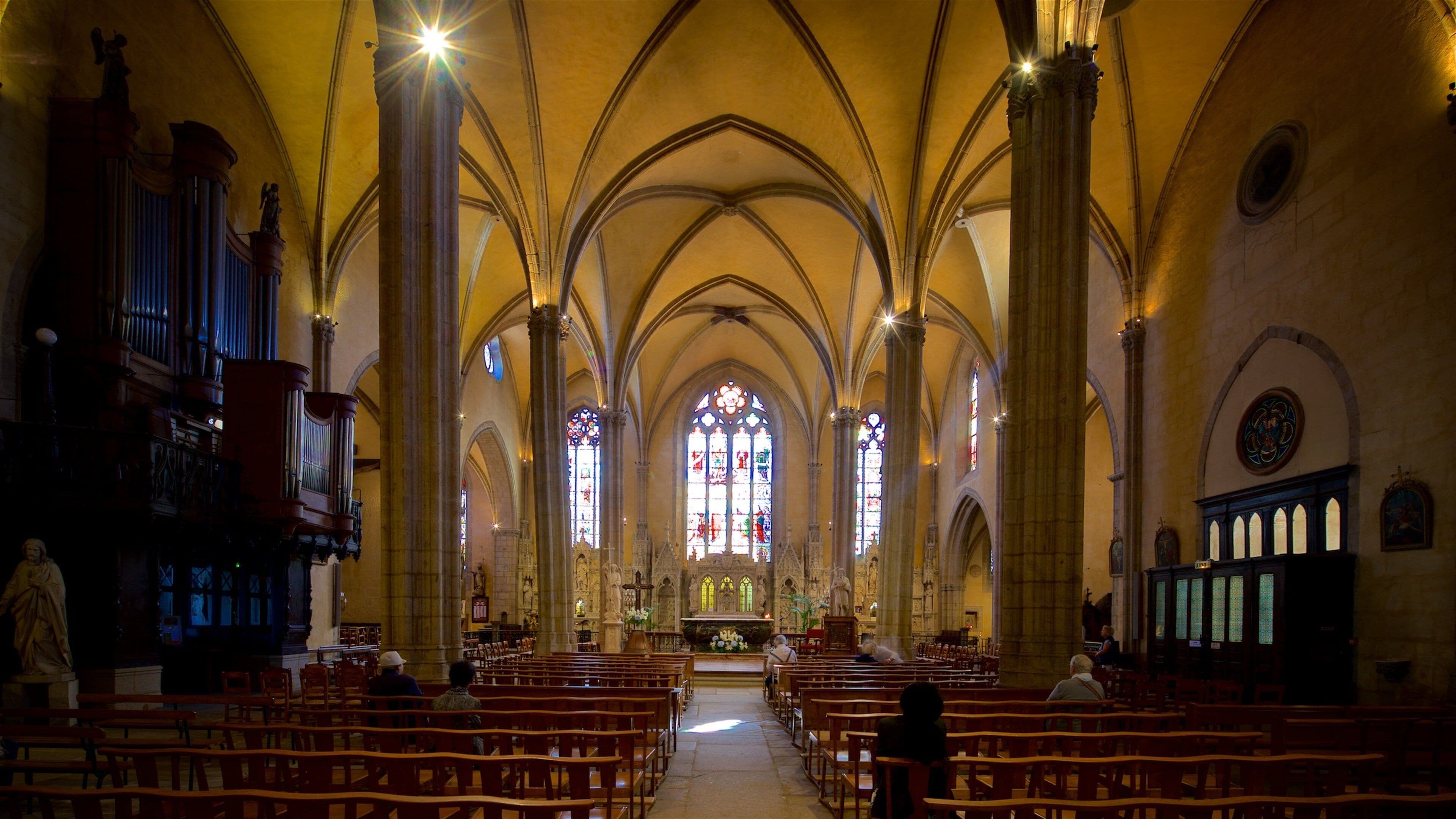 Church of St-Michel-des-Lions featuring heritage elements, a church or cathedral and interior views