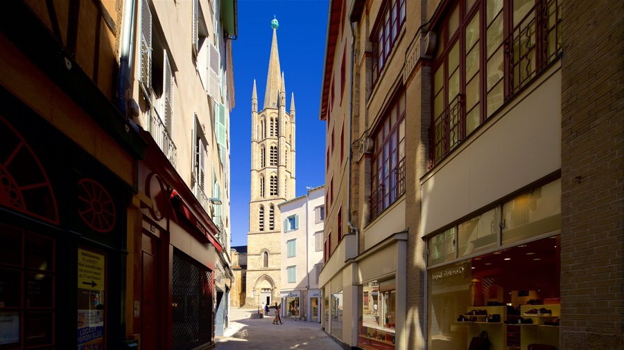 Church of St-Michel-des-Lions which includes a city and heritage architecture