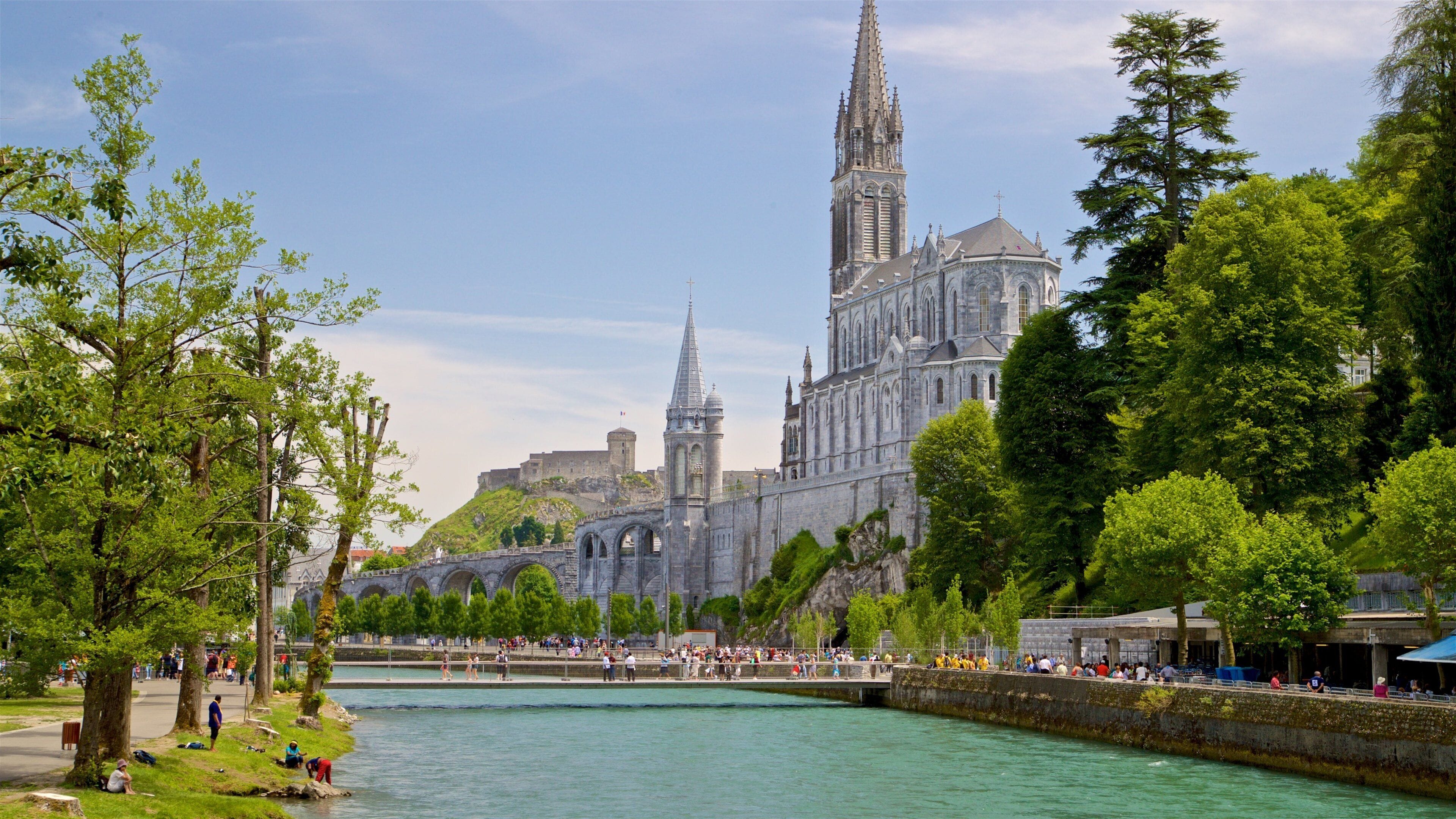 Notre-Dame de l\'Immaculee-Conception which includes heritage architecture, a river or creek and a church or cathedral