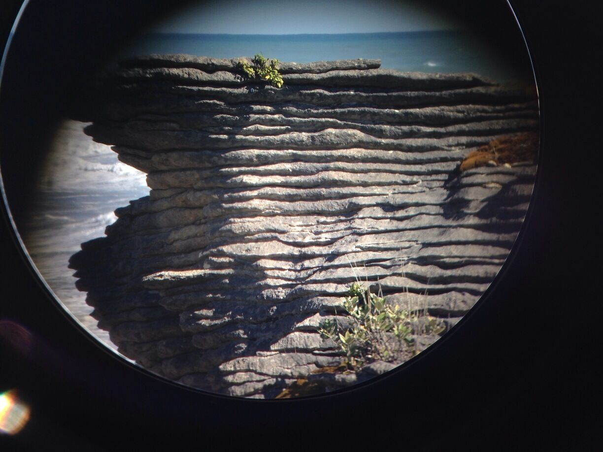 Pancake Rock thru binoculars
