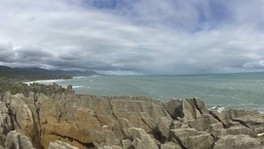Between Greymouth and Hokitika you can stop at the pancake rocks and blowholes. Really cool rock formation, now thought to be carved out by the wind