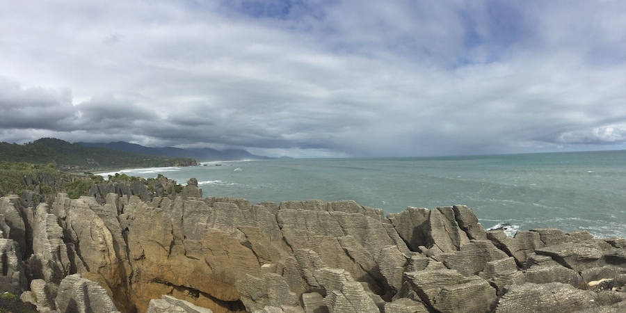 Between Greymouth and Hokitika you can stop at the pancake rocks and blowholes. Really cool rock formation, now thought to be carved out by the wind