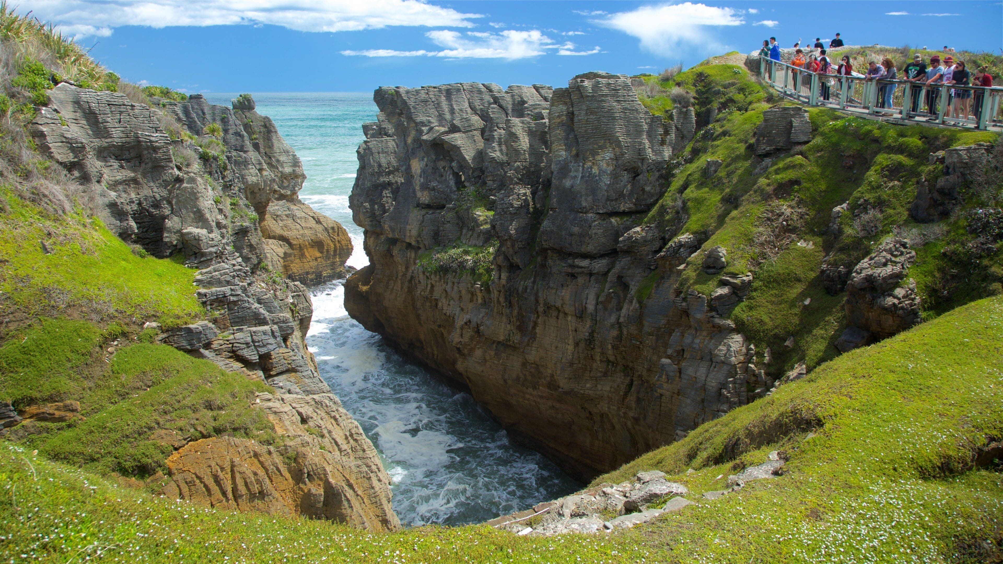 Pancake Rocks featuring rocky coastline, views and a bay or harbour