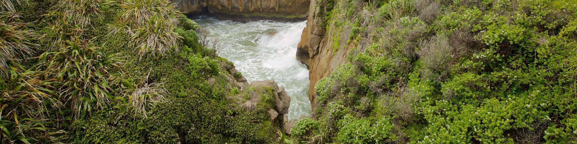 Pancake Rocks featuring a river or creek and tranquil scenes