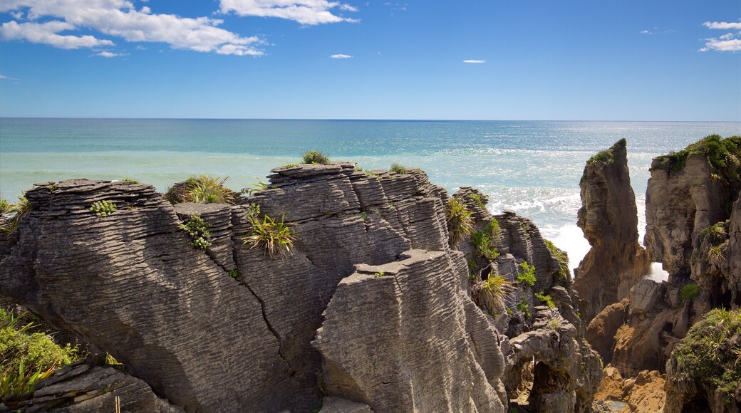 Pancake Rocks featuring rocky coastline and a bay or harbor