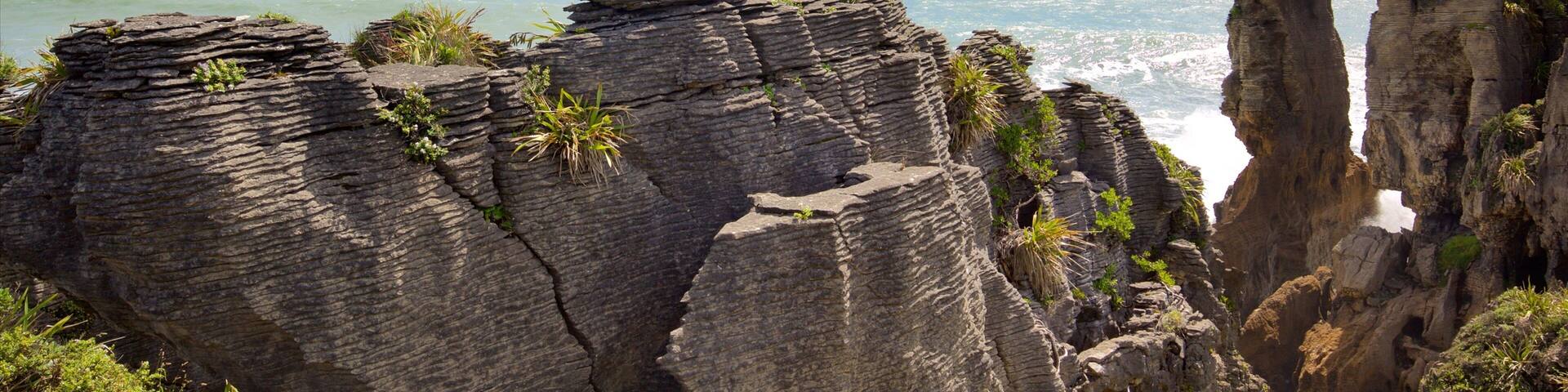Pancake Rocks showing rugged coastline and a bay or harbor