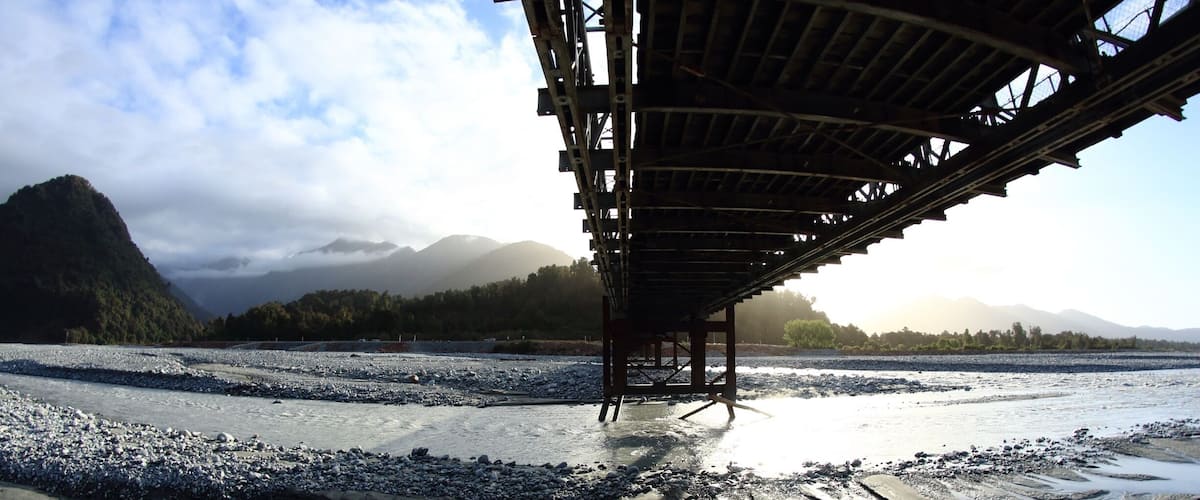 From under the bridge. Sunshine glazes the glacial runoff just down from the terminal face. 
#newzealand #hiking #adventure #travel