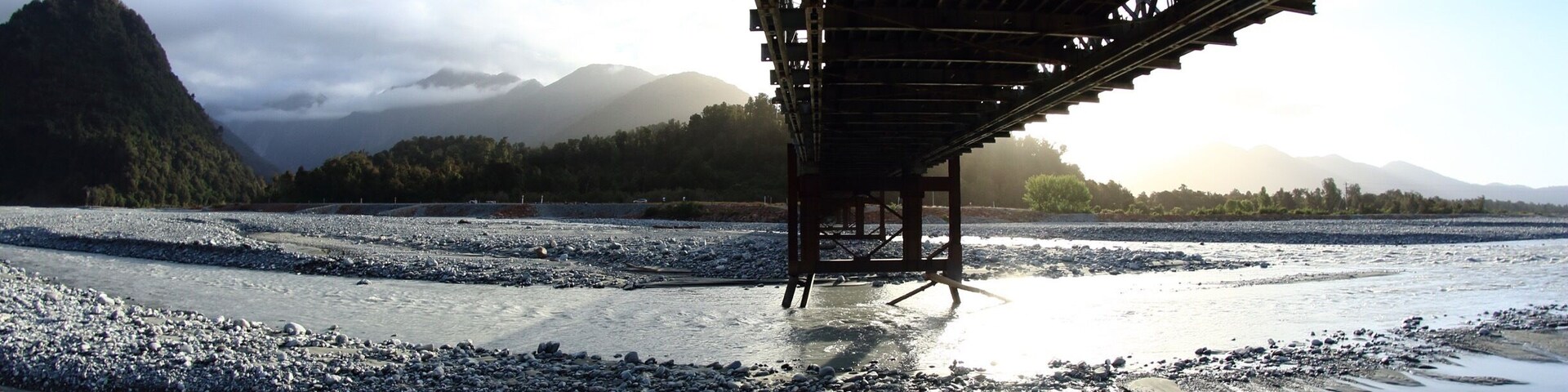 From under the bridge. Sunshine glazes the glacial runoff just down from the terminal face. 
#newzealand #hiking #adventure #travel