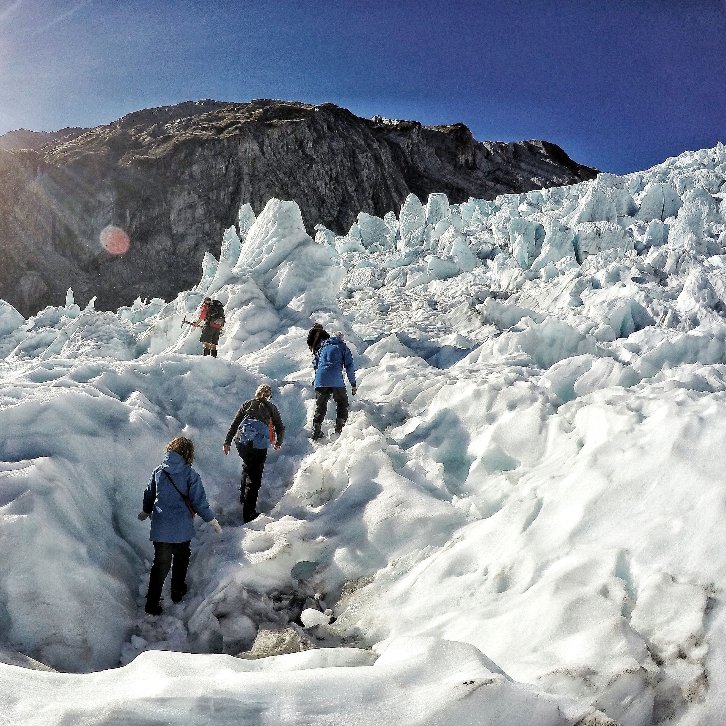 Heli-hiking the Franz Josef Glacier on New Zealand's West Coast. We climbed up through these incredible ice formations towering over our heads, crawled through ice caves and watched blocks of ice tumbling down what's known as the 'bowling alley' in the distance. This is one for all of your bucket lists! #gopro