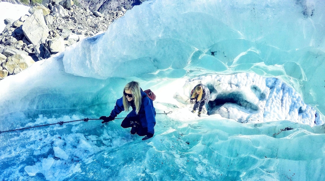 Climbing through some epic ice formations on the Franz Josef Glacier #blue #bucketlist #adventure